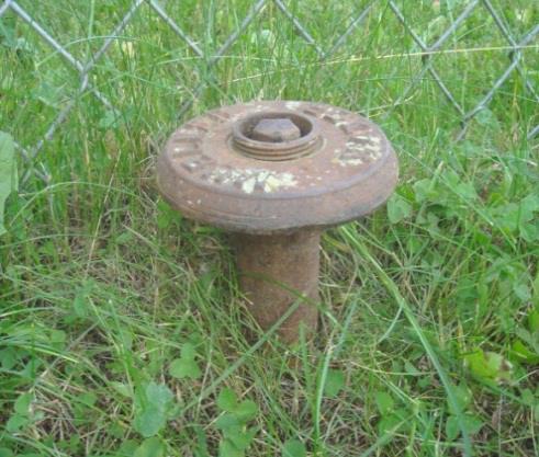 Keybox protruding from ground